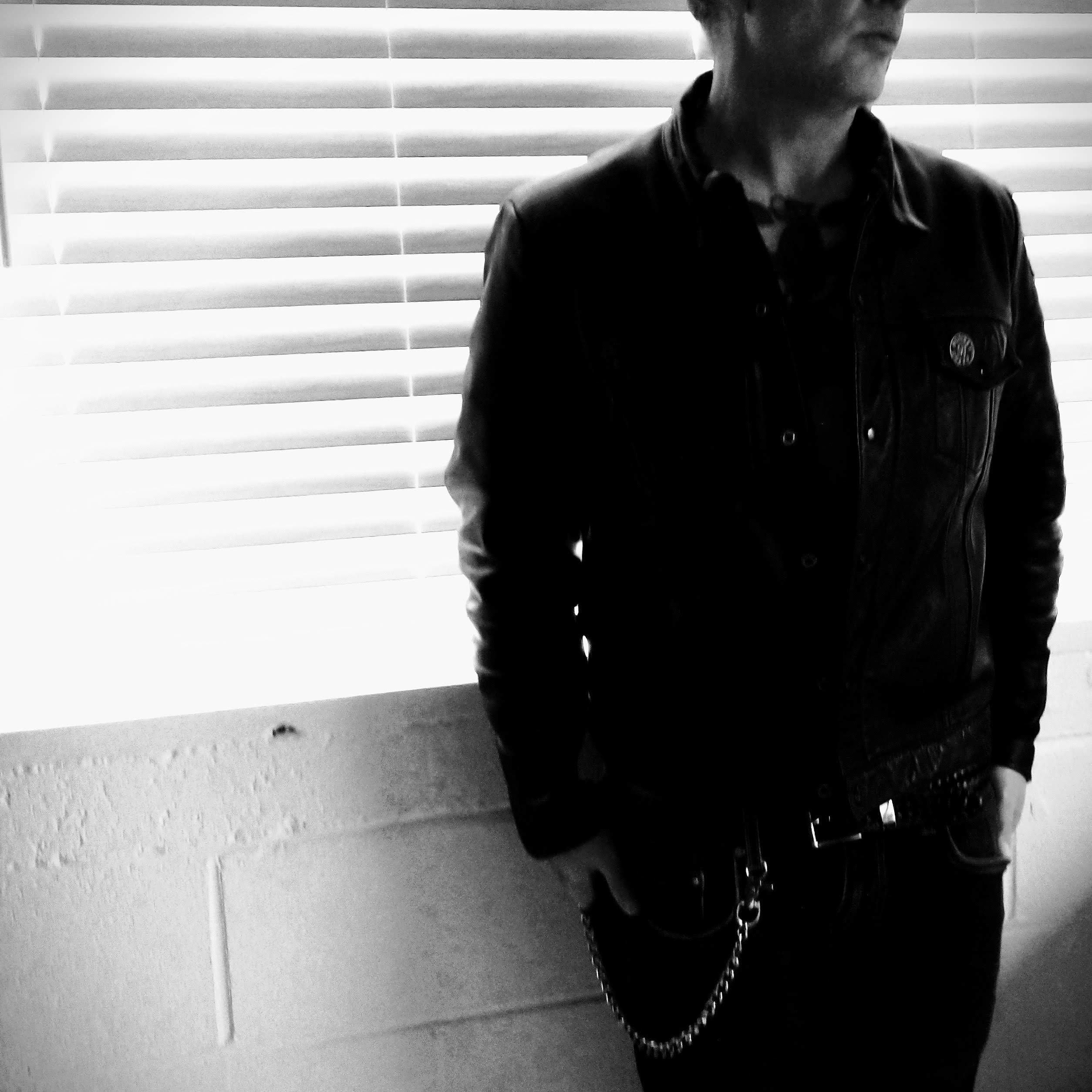 Black jacket / window portrait